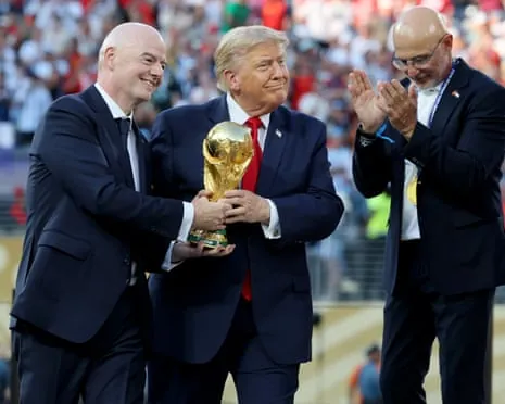 Gianni Infantino and Donald Trump with the World Cup trophy after the final match between Spain and Argentina.