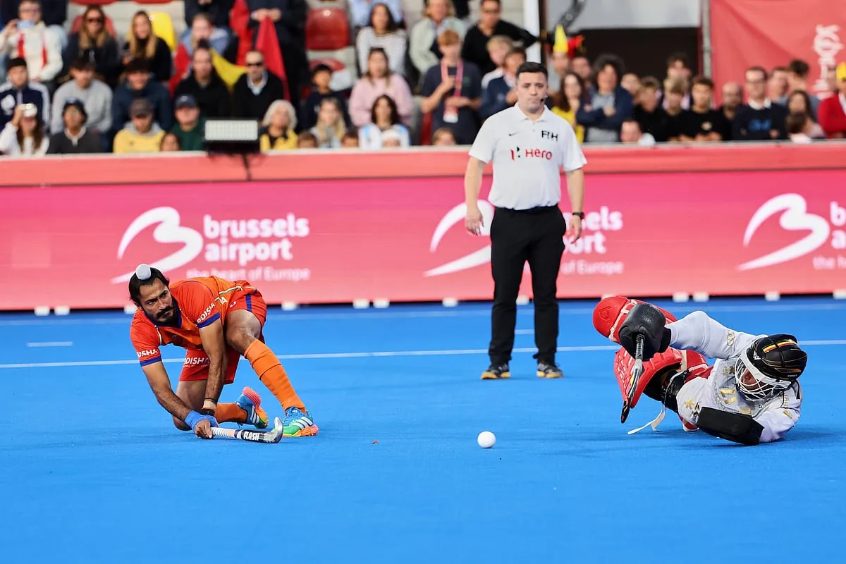 Players in action during the seventh-eighth play-off match between India and Belgium on Friday